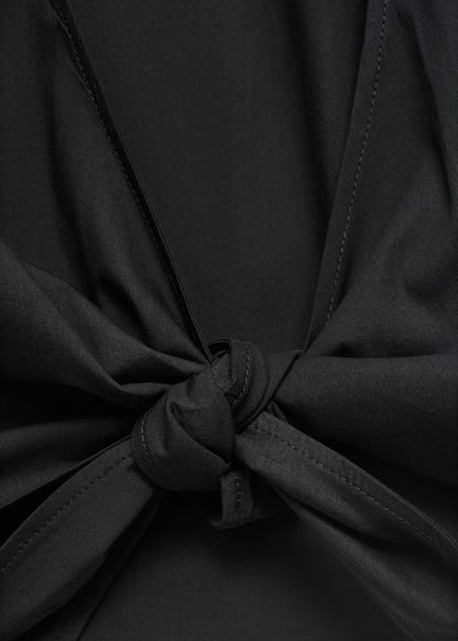 CROP TOP WITH BOW ON  BACK